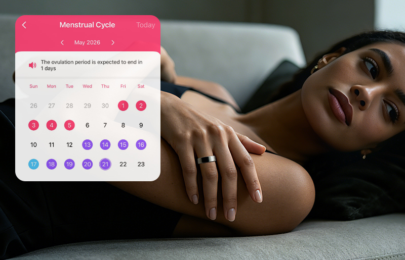 Woman wearing Vanberray Smart Ring with menstrual cycle app panel